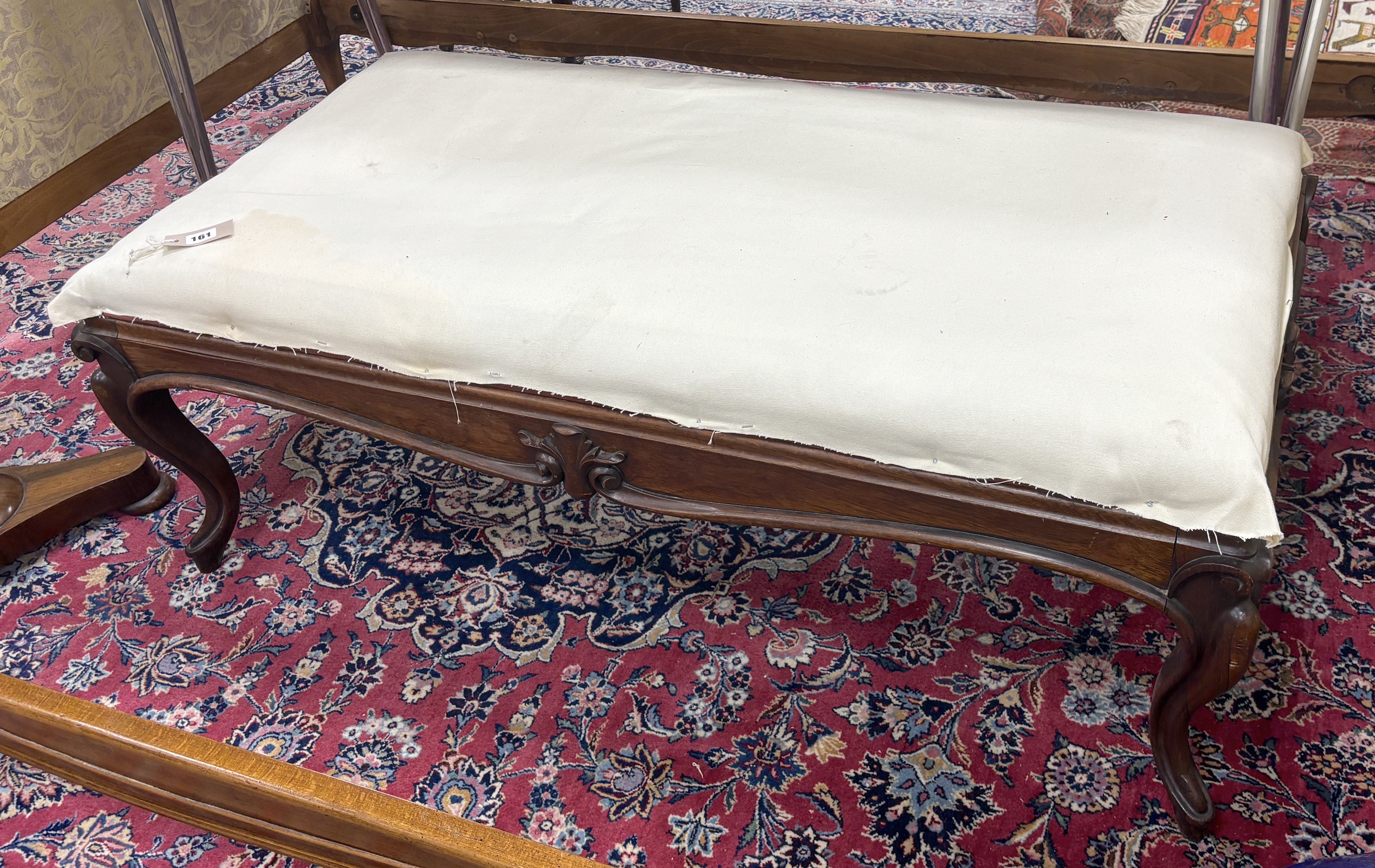 A large Victorian rectangular rosewood stool with upholstered drop in seat, width 124cm, depth 65cm, height 44cm